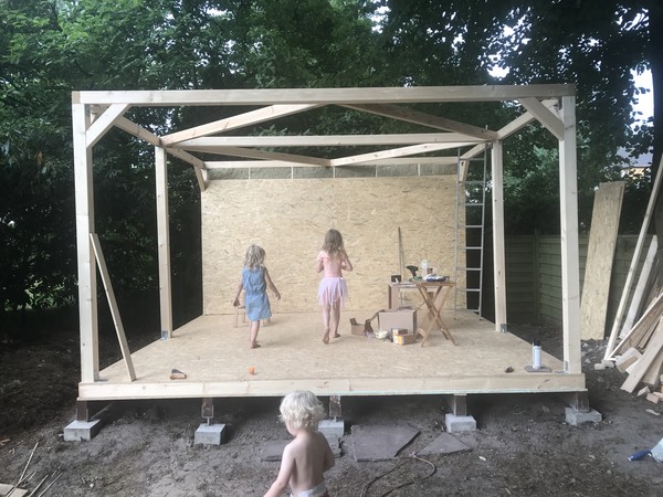 My kids inspecting the back wall