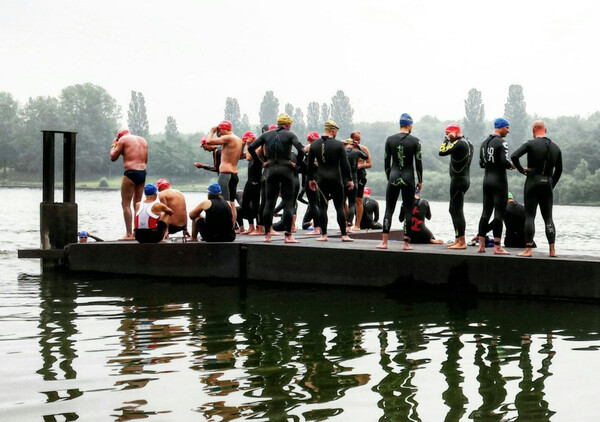 A rather small group of motivated swimmers ready to go