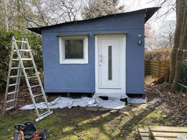 Some manual labor never fails to satisfy: painting the home office shed blue